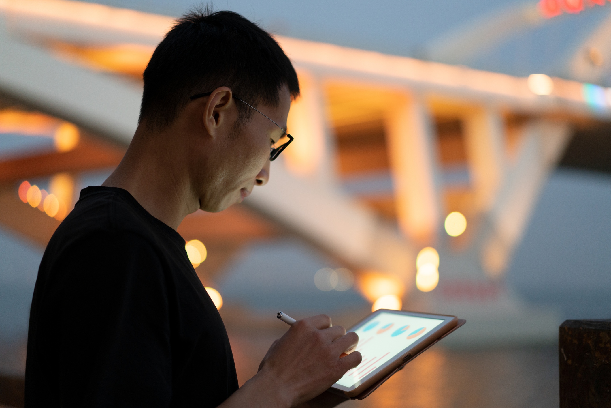 Man looking at ipad