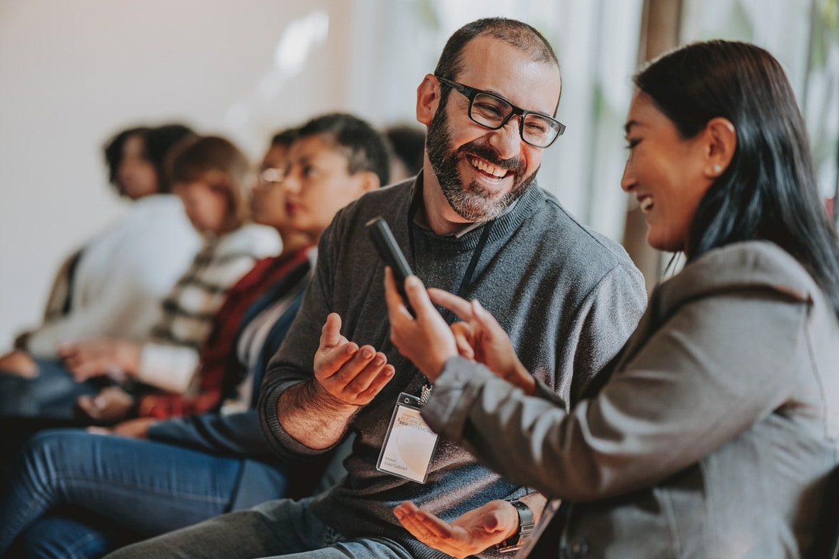 Two people laughing together
