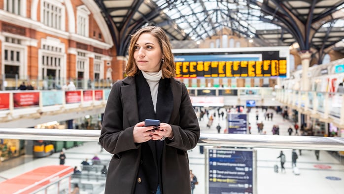 Woman waiting in train station