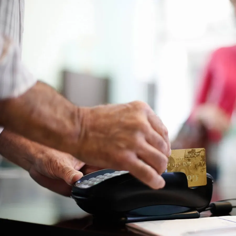 Person paying with credit card 